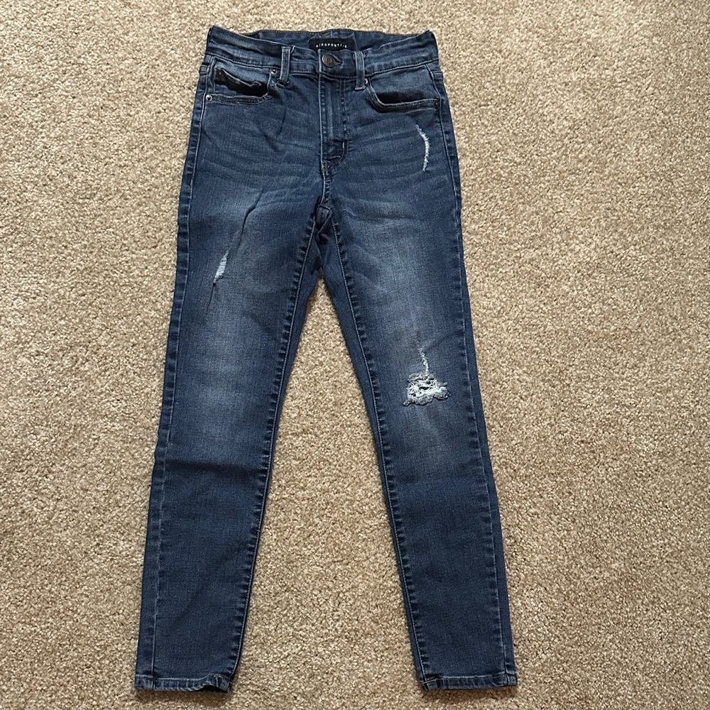 Women's Distressed Blue Jeans